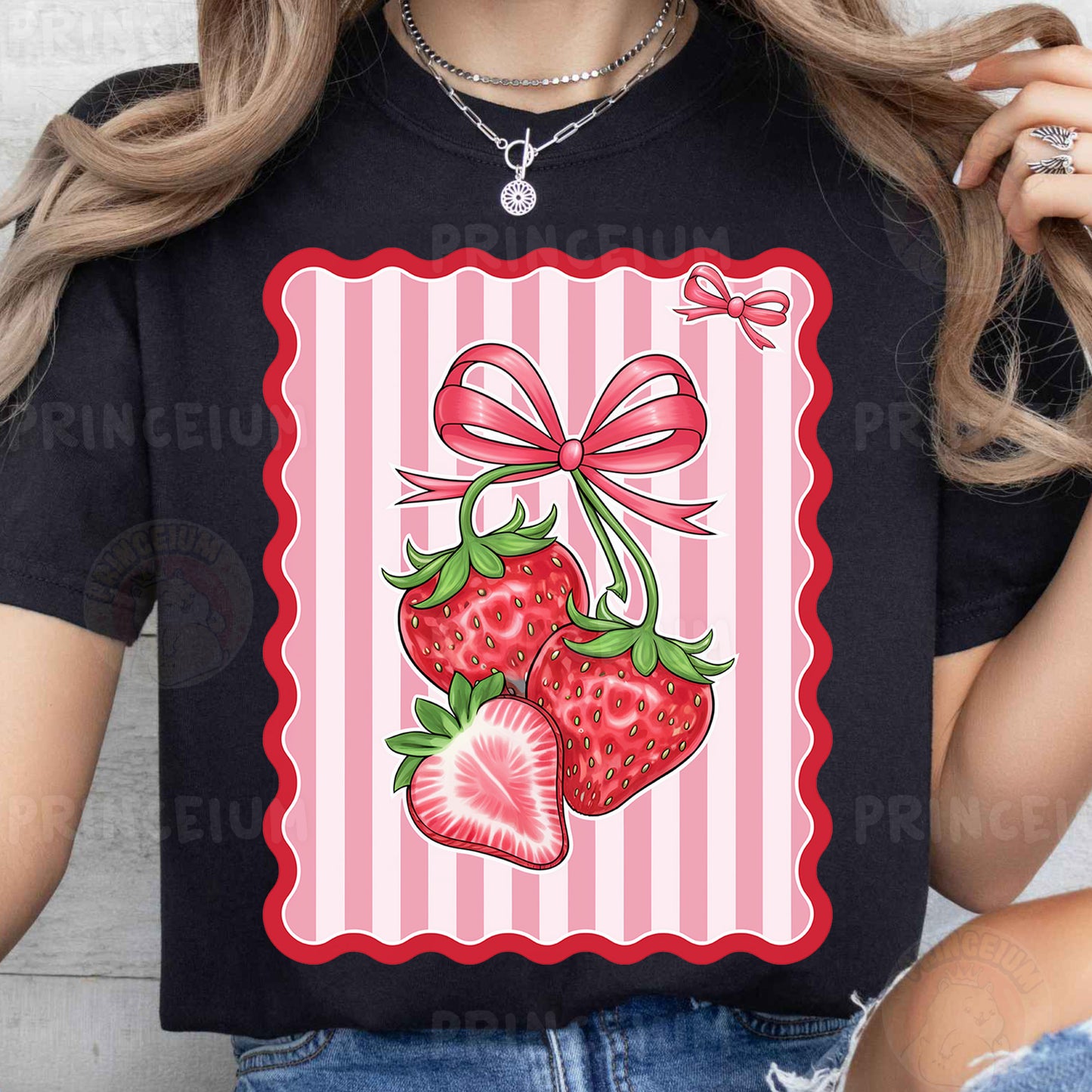 a woman wearing a black shirt with strawberries on it