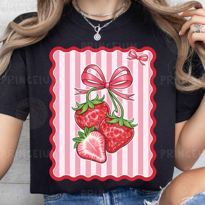 a woman wearing a black shirt with strawberries on it