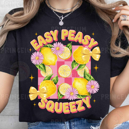 a woman wearing a t - shirt that says easy peasy squeezey