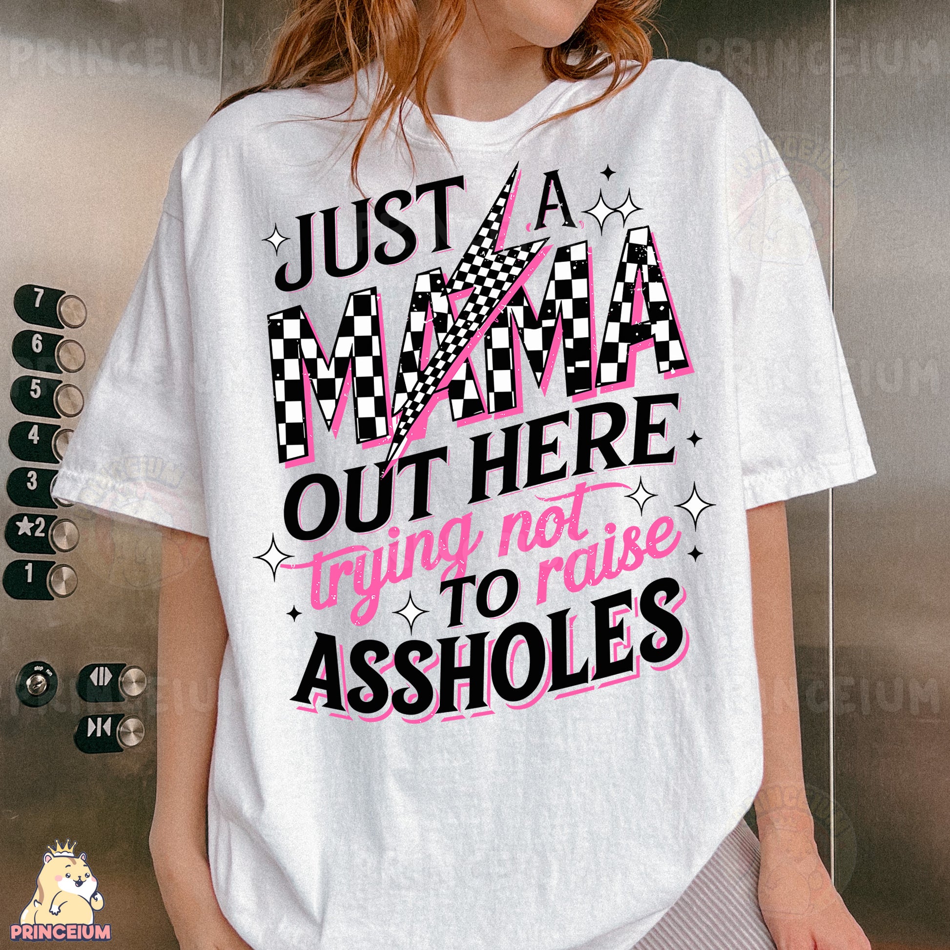 a woman wearing a t - shirt that says just a mama out here trying to