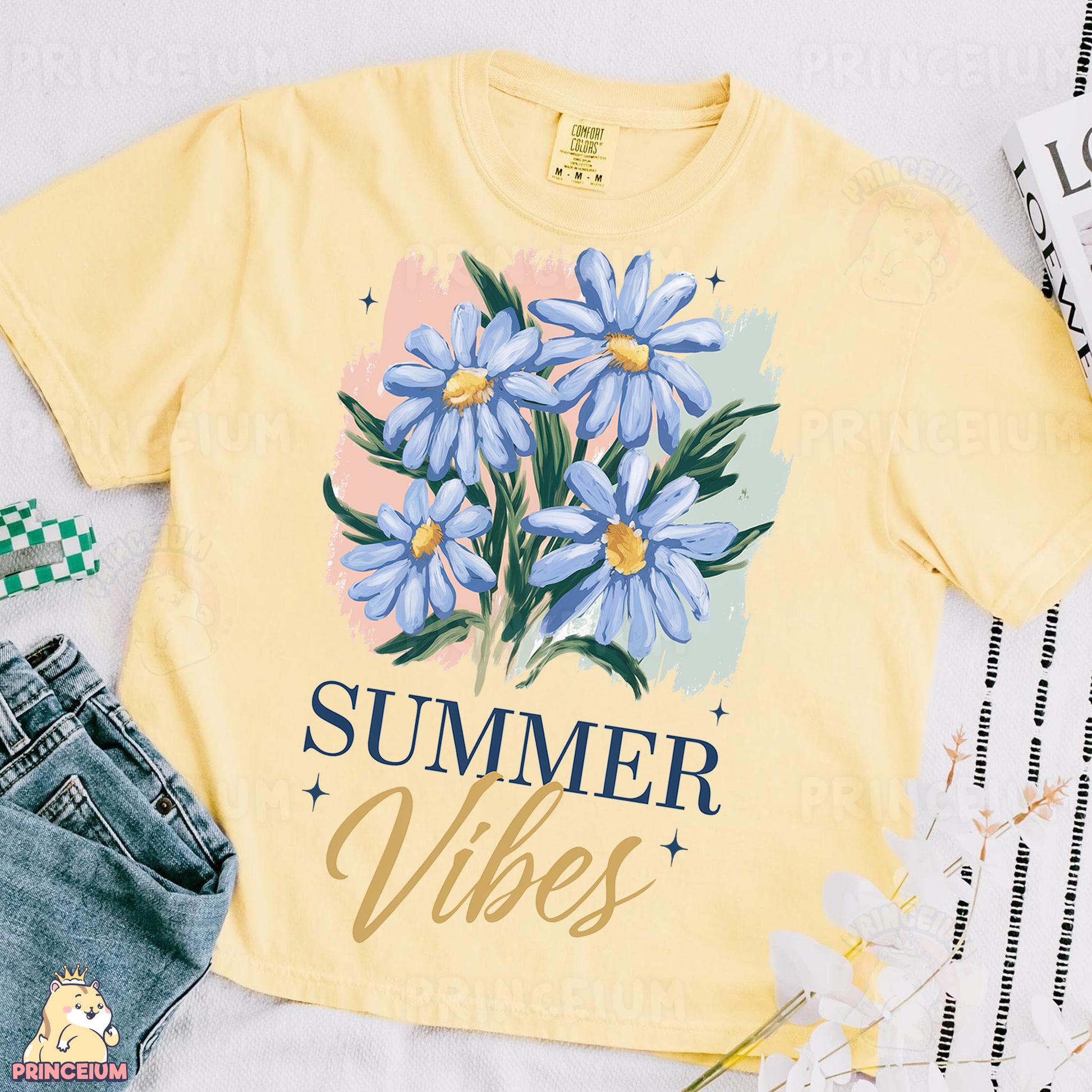 a yellow shirt with blue flowers on it