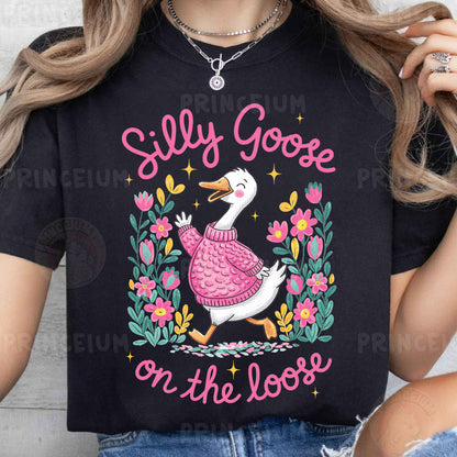 a woman wearing a t - shirt that says silly goose on the loose