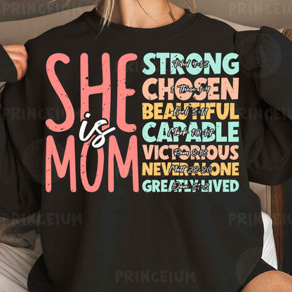 a woman wearing a black shirt that says she is a mom