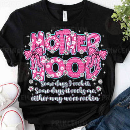 a t - shirt with the words motherhood on it