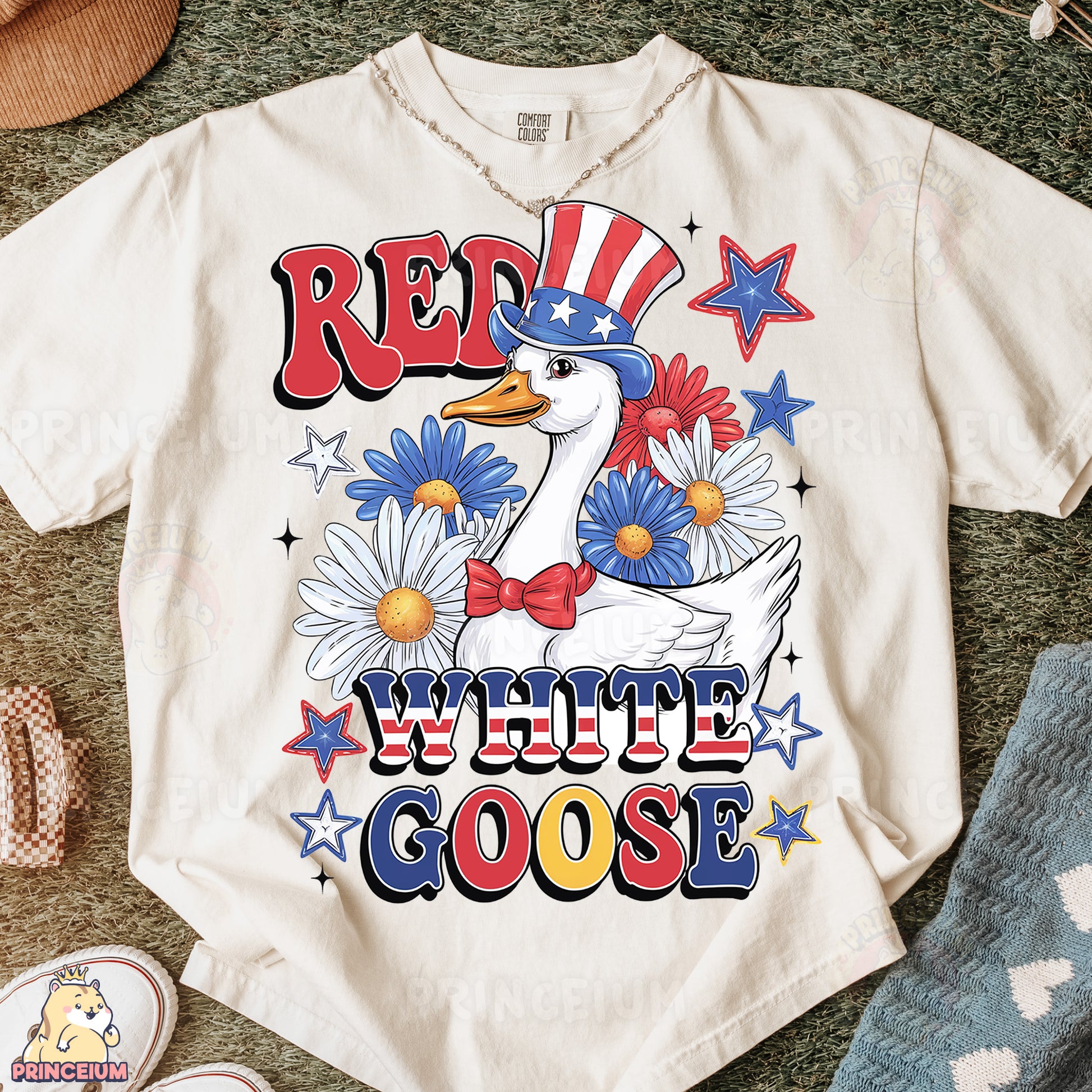a white t - shirt with a goose wearing a red, white, and blue