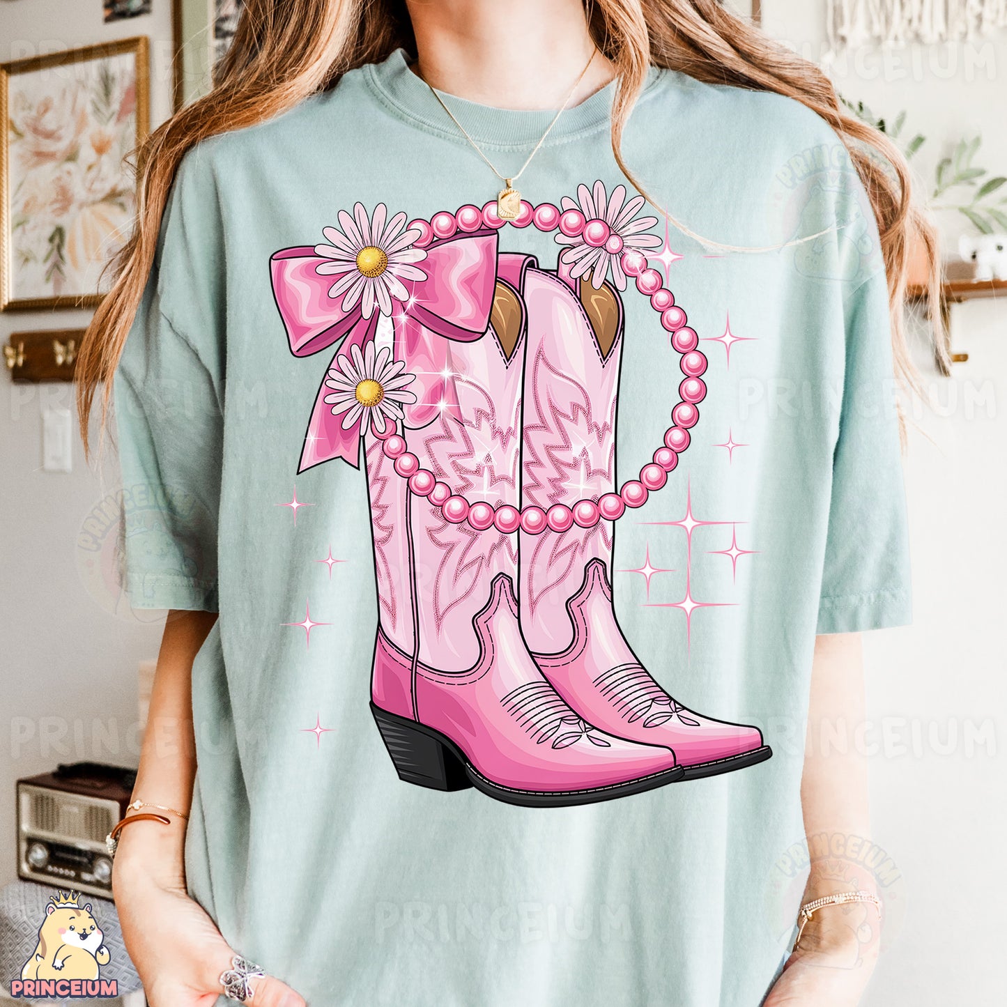 a woman wearing a t - shirt with a pink cowboy boot on it