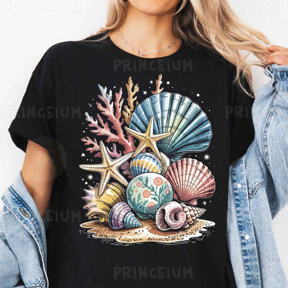 a woman wearing a black t - shirt with seashells and starfish on