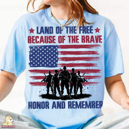 a woman wearing a t - shirt that says land of the free because of the