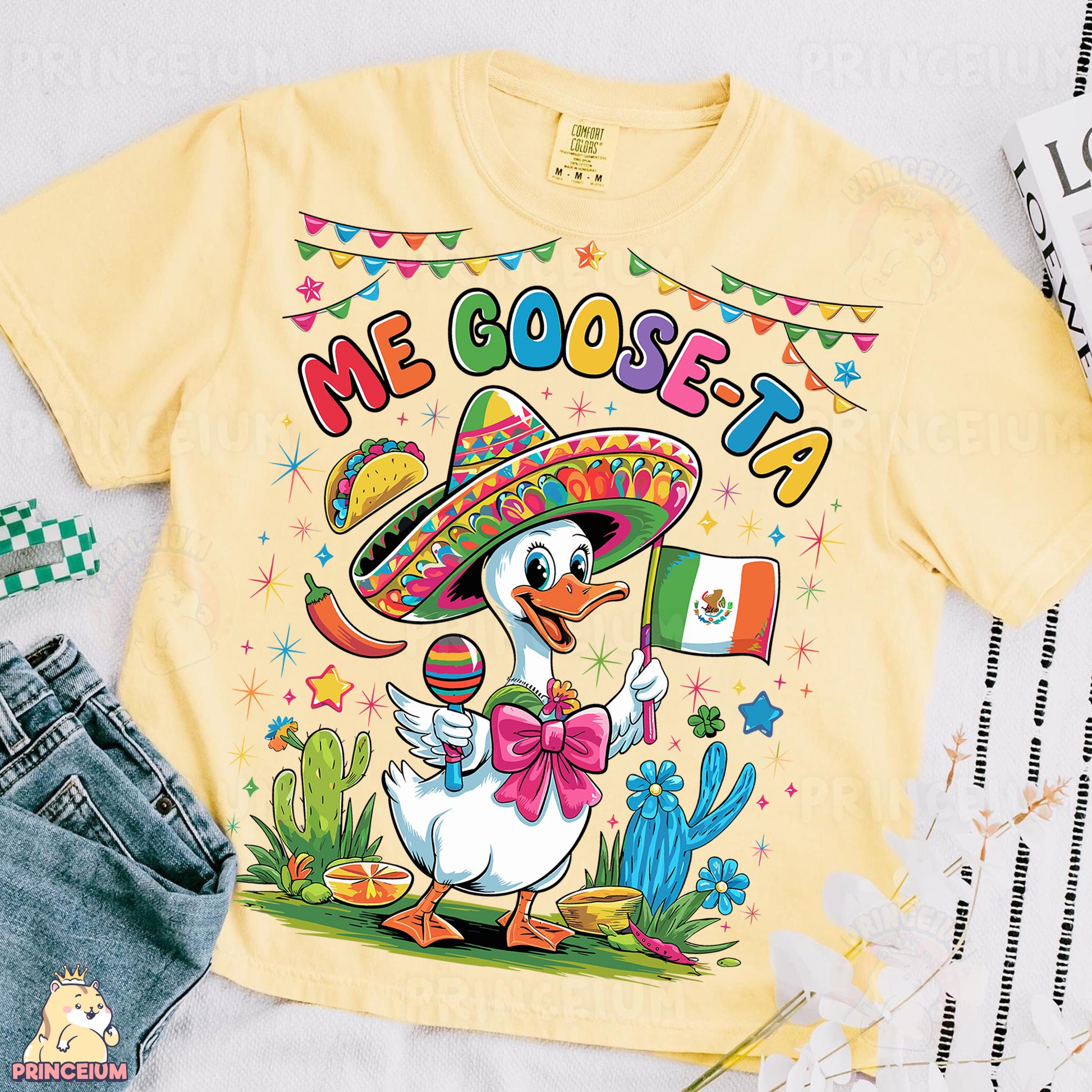 a yellow shirt with a duck wearing a sombrero