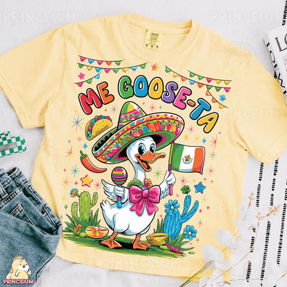 a yellow shirt with a duck wearing a sombrero