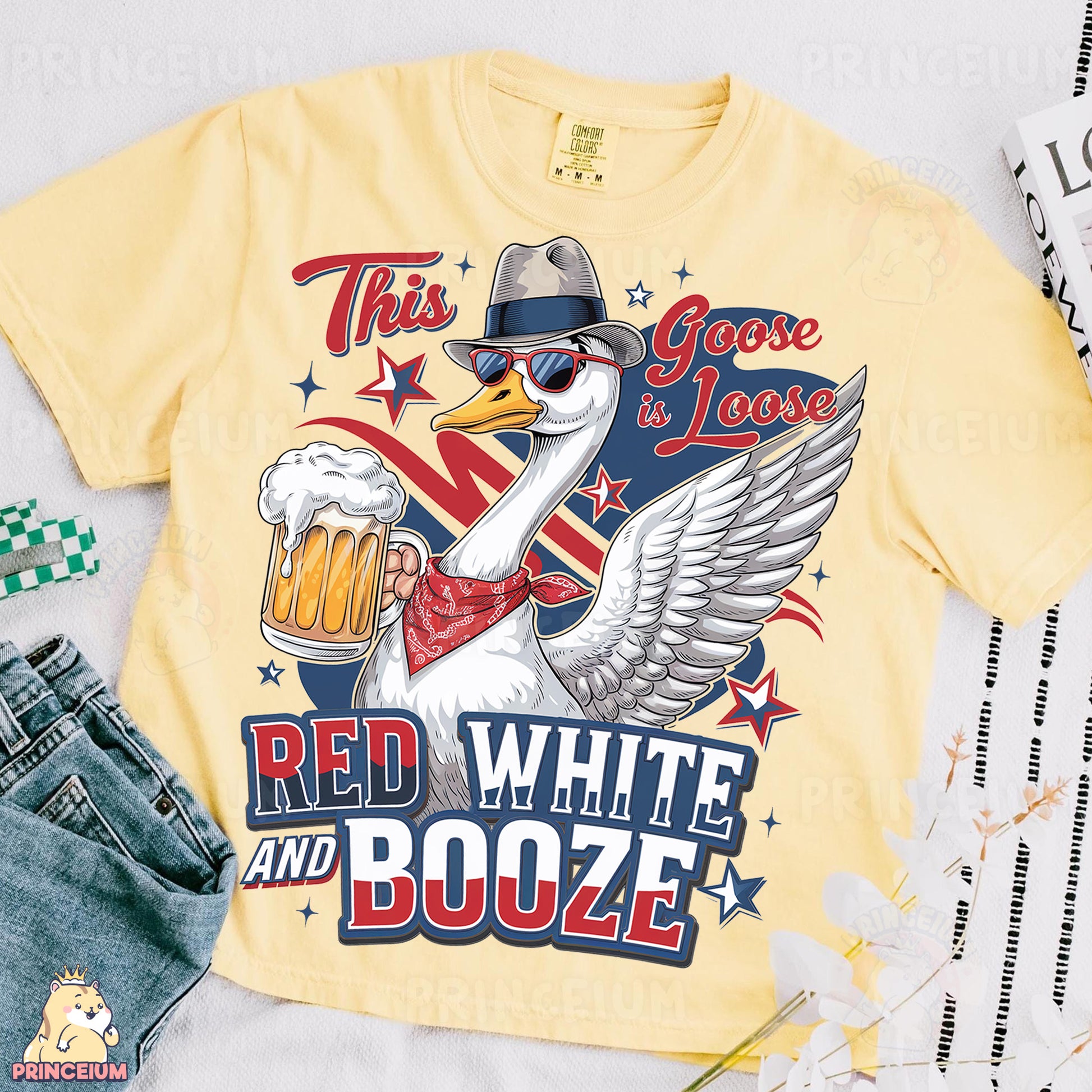 a yellow shirt with a goose wearing a hat and holding a beer