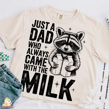 a t - shirt with a raccoon holding a box of milk