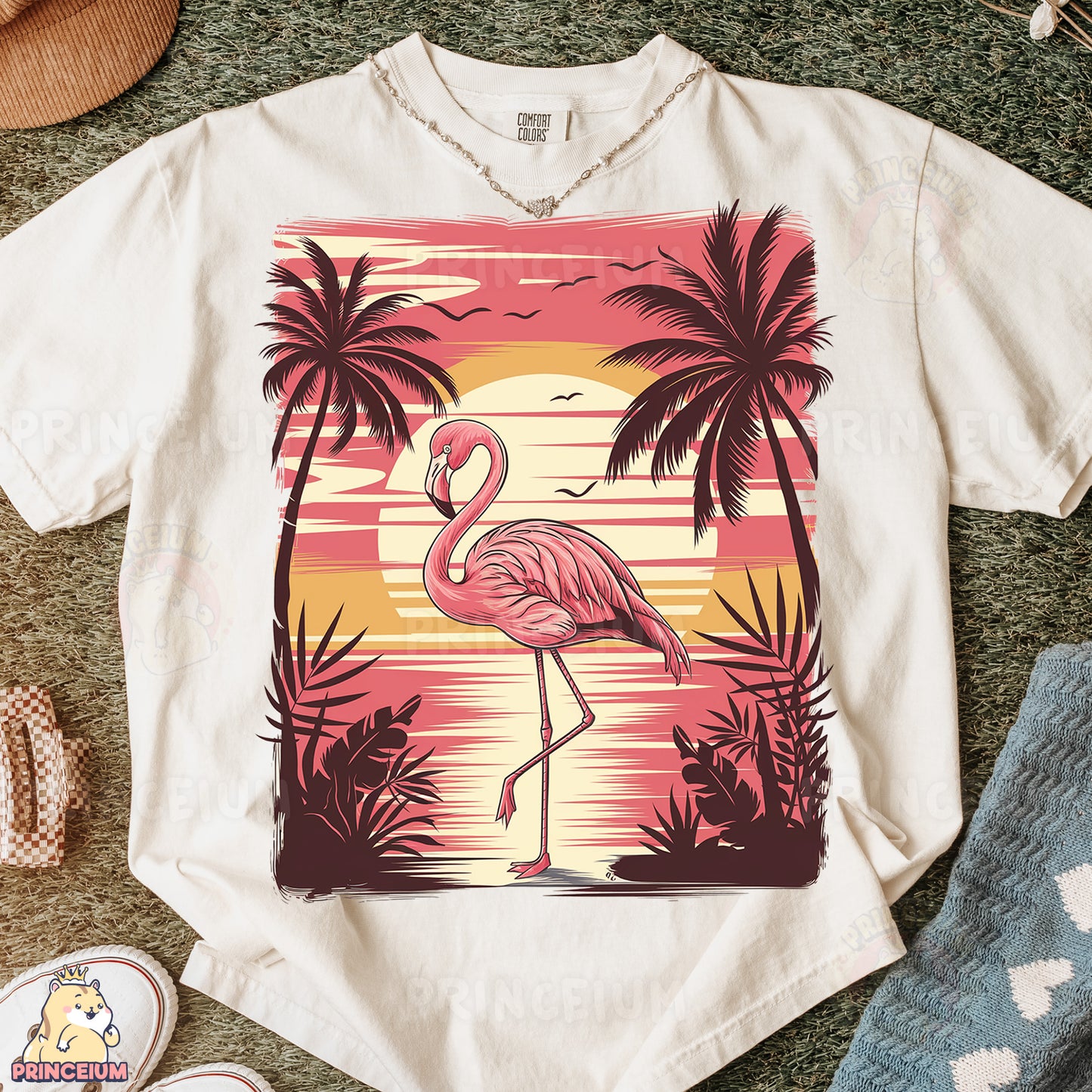 a white shirt with a pink flamingo on it