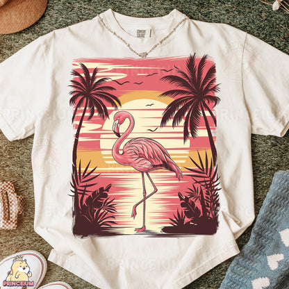 a white shirt with a pink flamingo on it