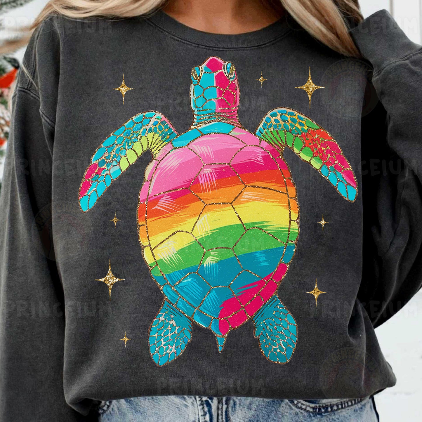 a woman wearing a sweatshirt with a rainbow turtle on it