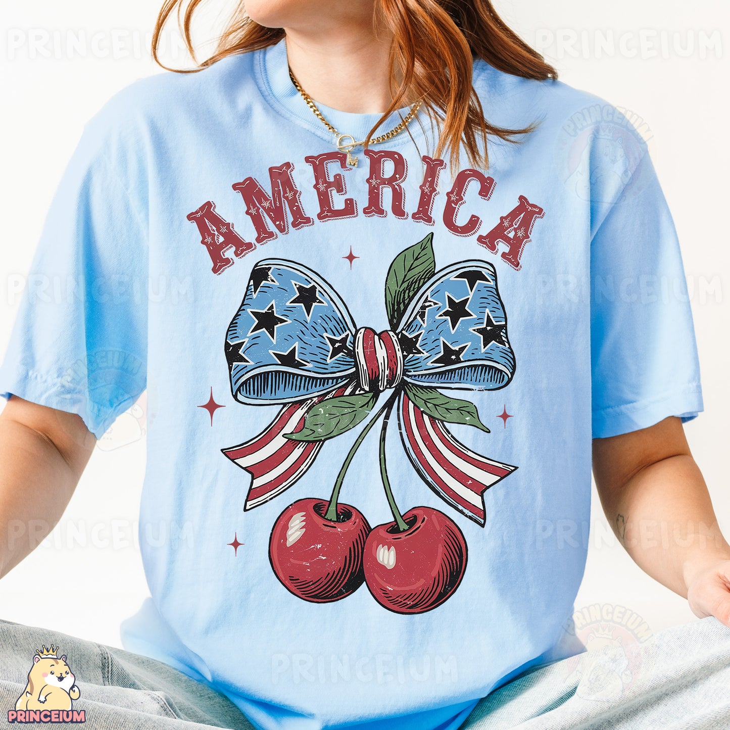 a woman wearing a blue shirt with a bow and two cherries on it