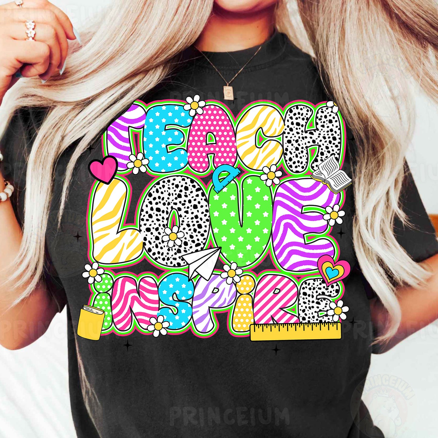 a woman wearing a black tshirt with a colorful graphic