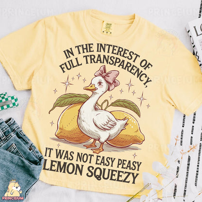 a yellow t - shirt with a picture of a duck on it