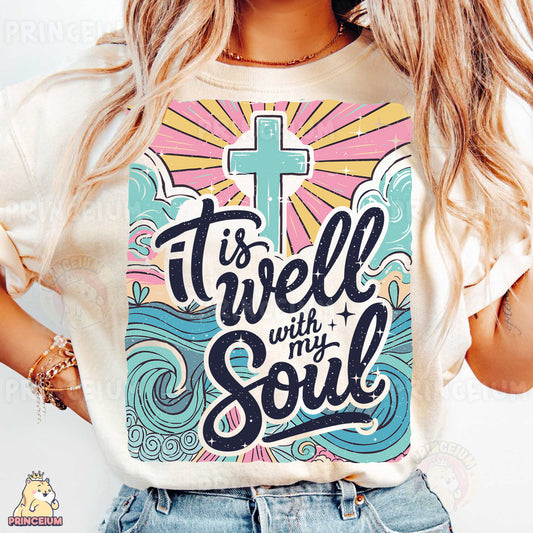 a woman wearing a t - shirt with a cross on it