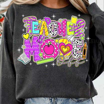 a woman wearing a teacher mom sweatshirt