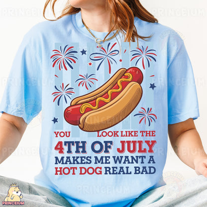 a woman wearing a blue shirt with a hot dog on it