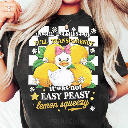 a woman wearing a black t - shirt with an image of a chicken on it
