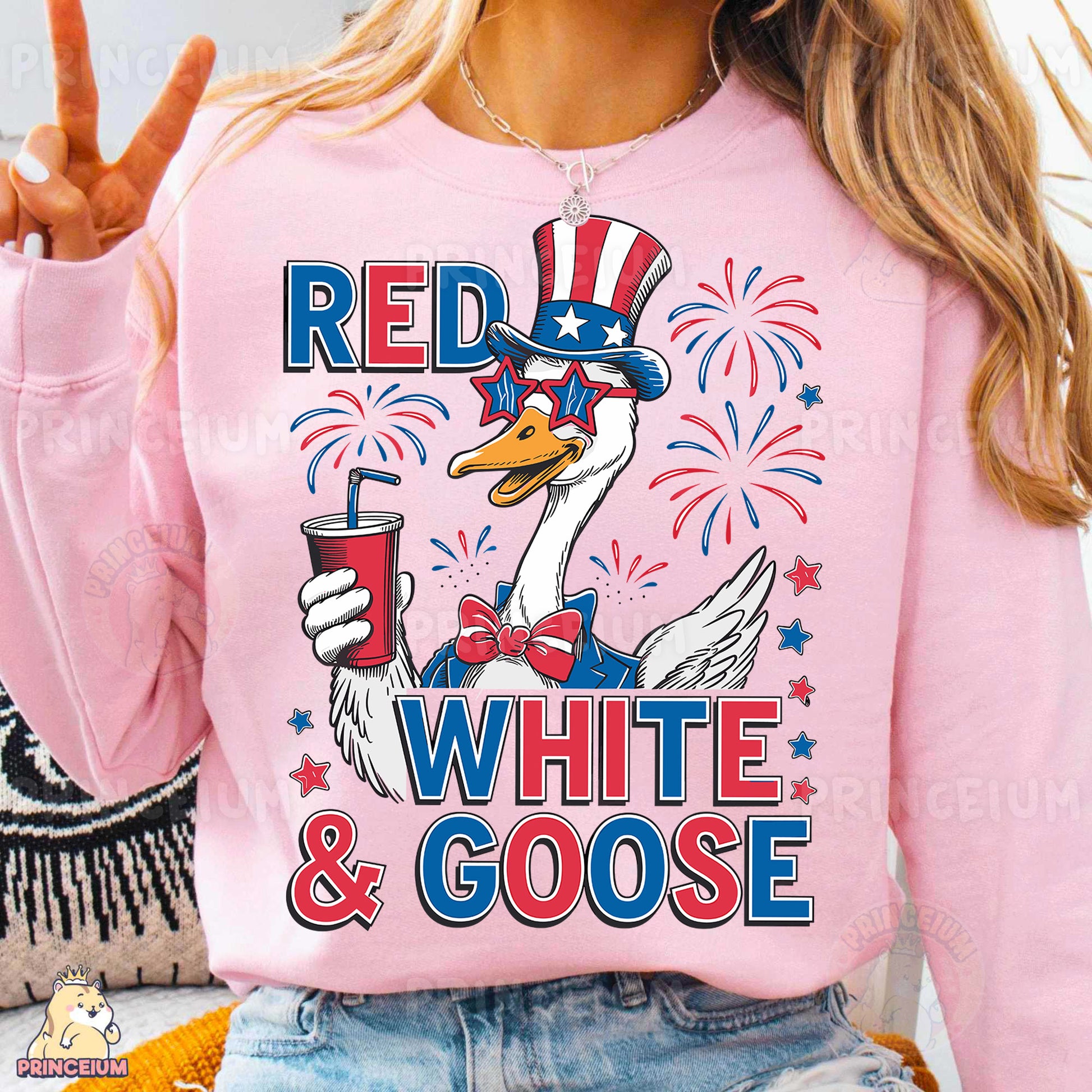 a woman wearing a red white and goose shirt