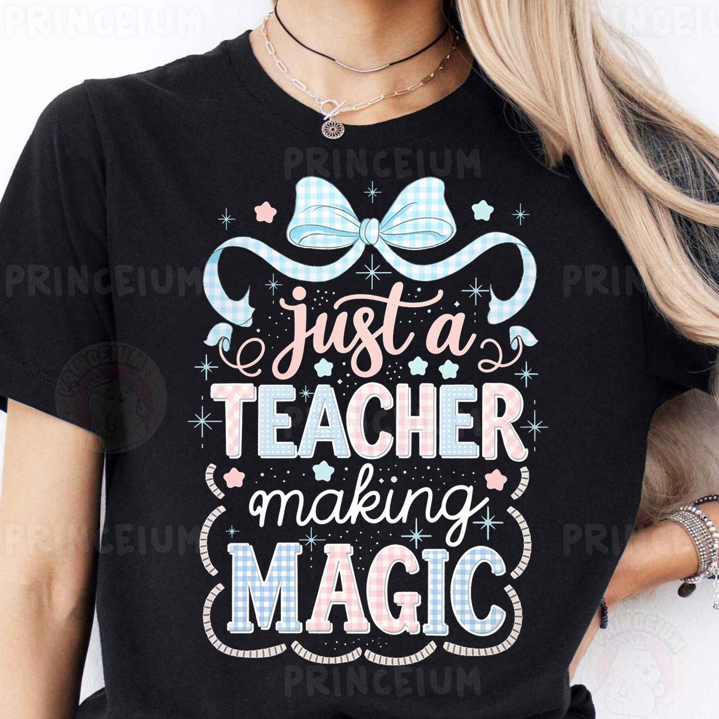 a woman wearing a t - shirt that says just a teacher making magic