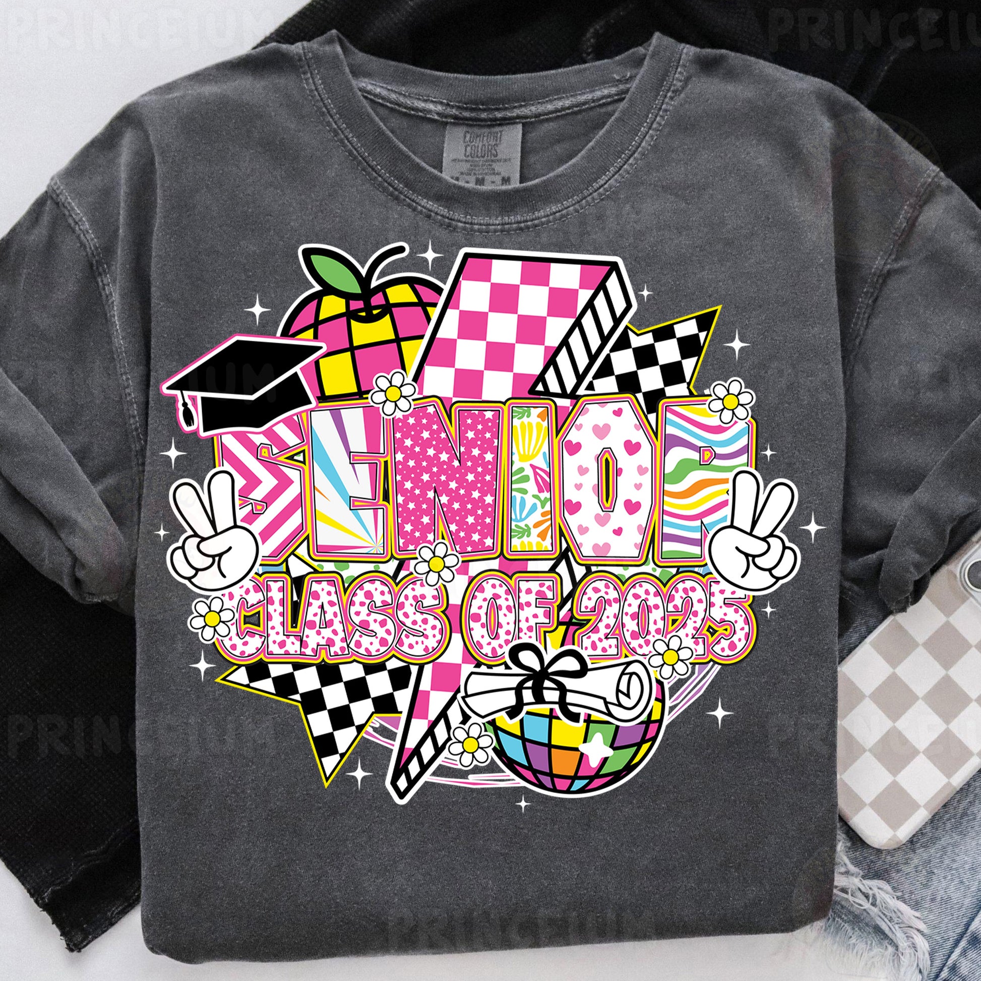 a black shirt with a pink and yellow design on it