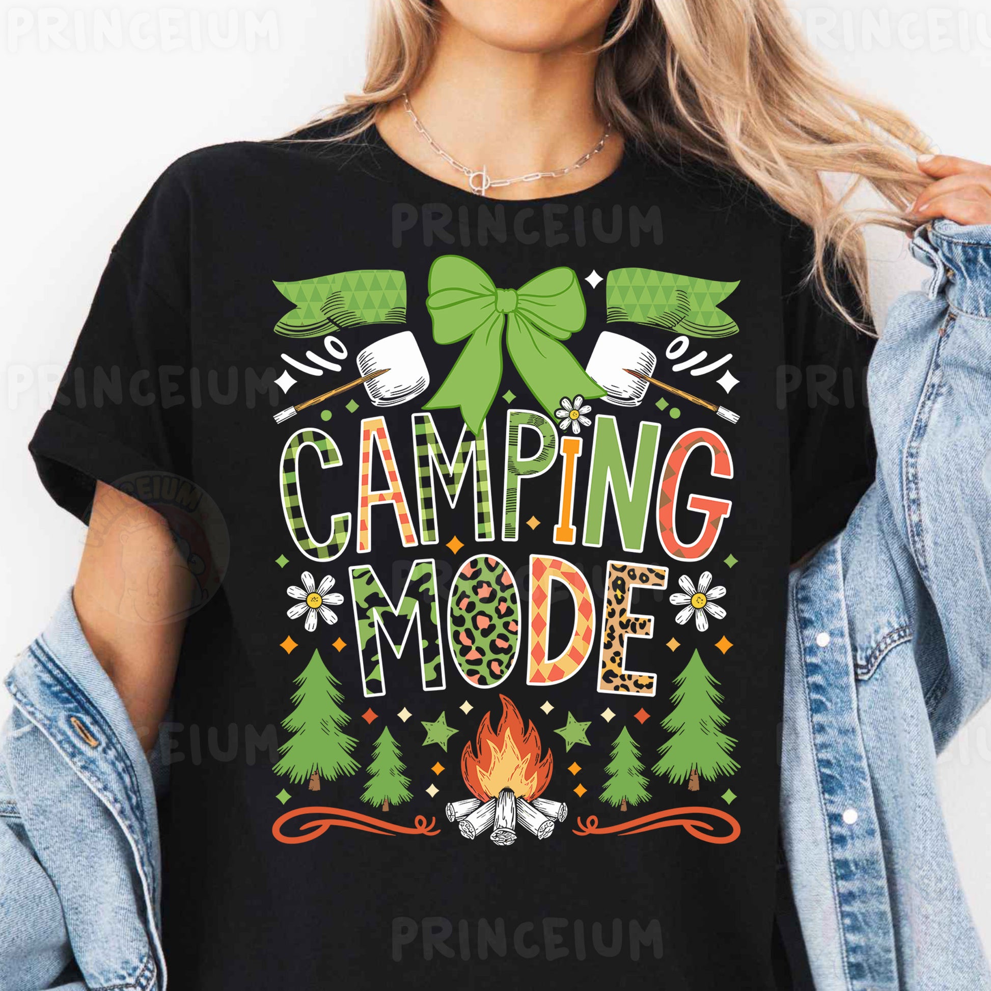 a woman wearing a black camping mode t - shirt