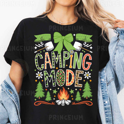 a woman wearing a black camping mode t - shirt