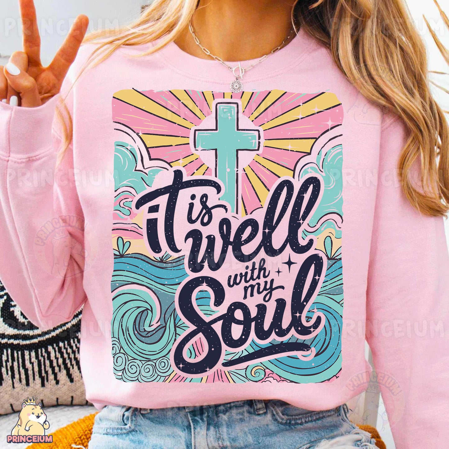 a woman wearing a pink shirt with a cross on it