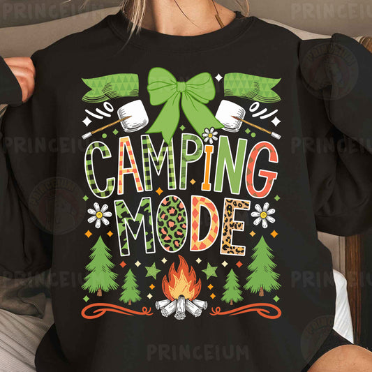 a woman wearing a black shirt that says camping mode