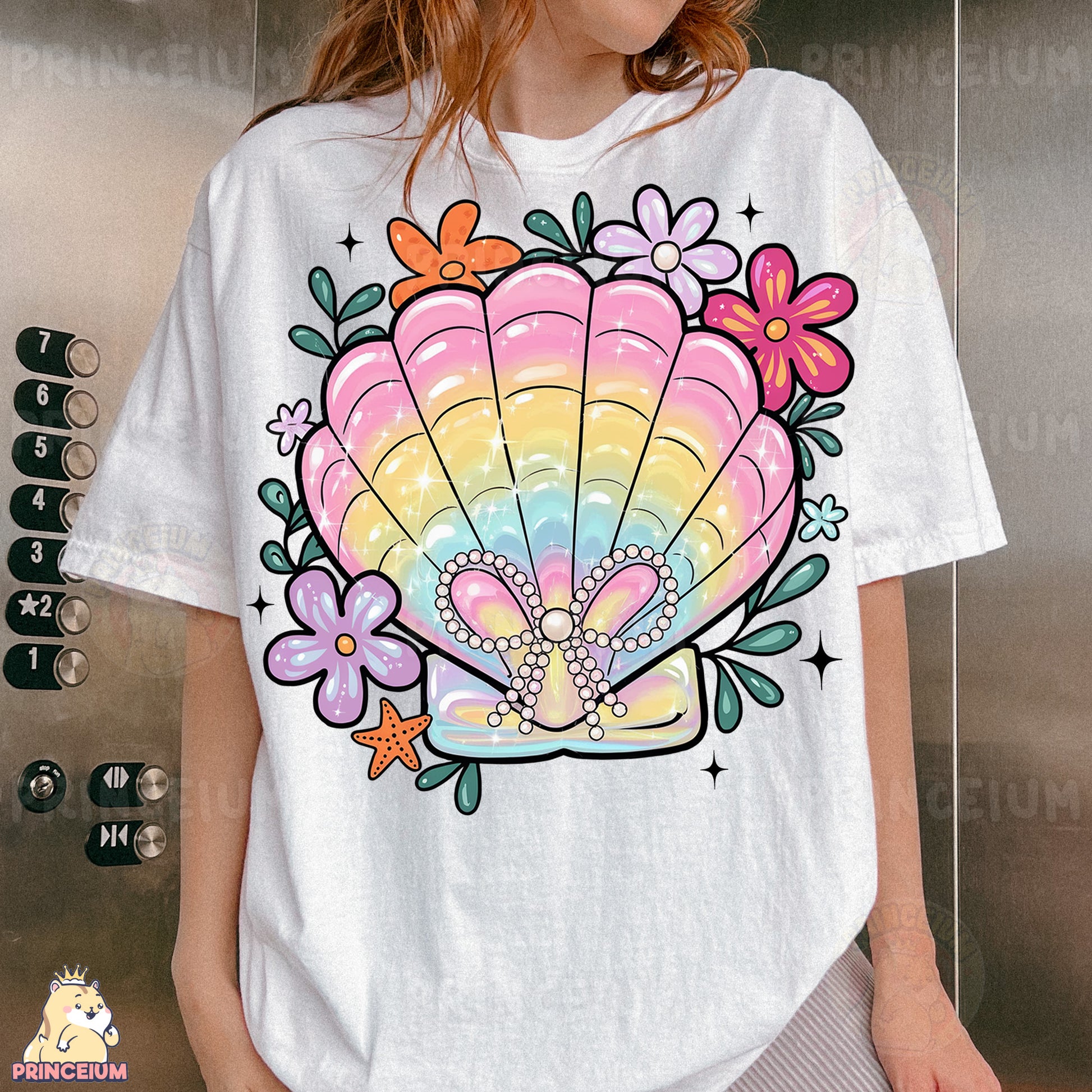 a woman wearing a t - shirt with a seashell on it