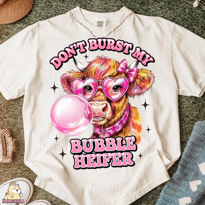 a t - shirt with a picture of a cow wearing glasses