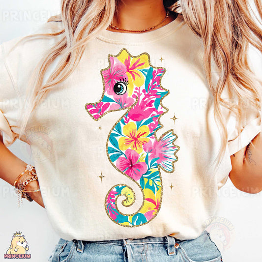 a woman wearing a t - shirt with a seahorse on it