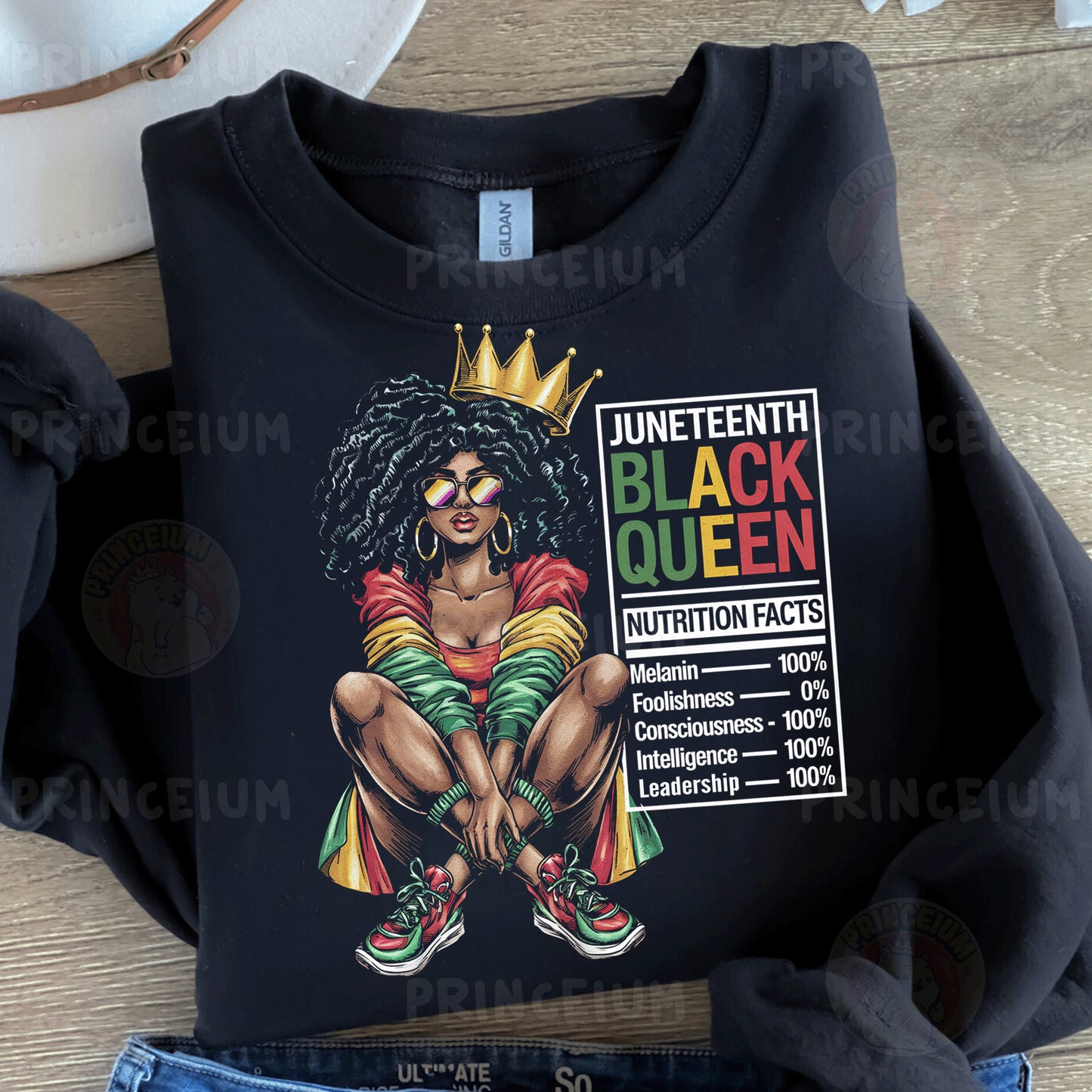a t - shirt with a picture of a black queen on it