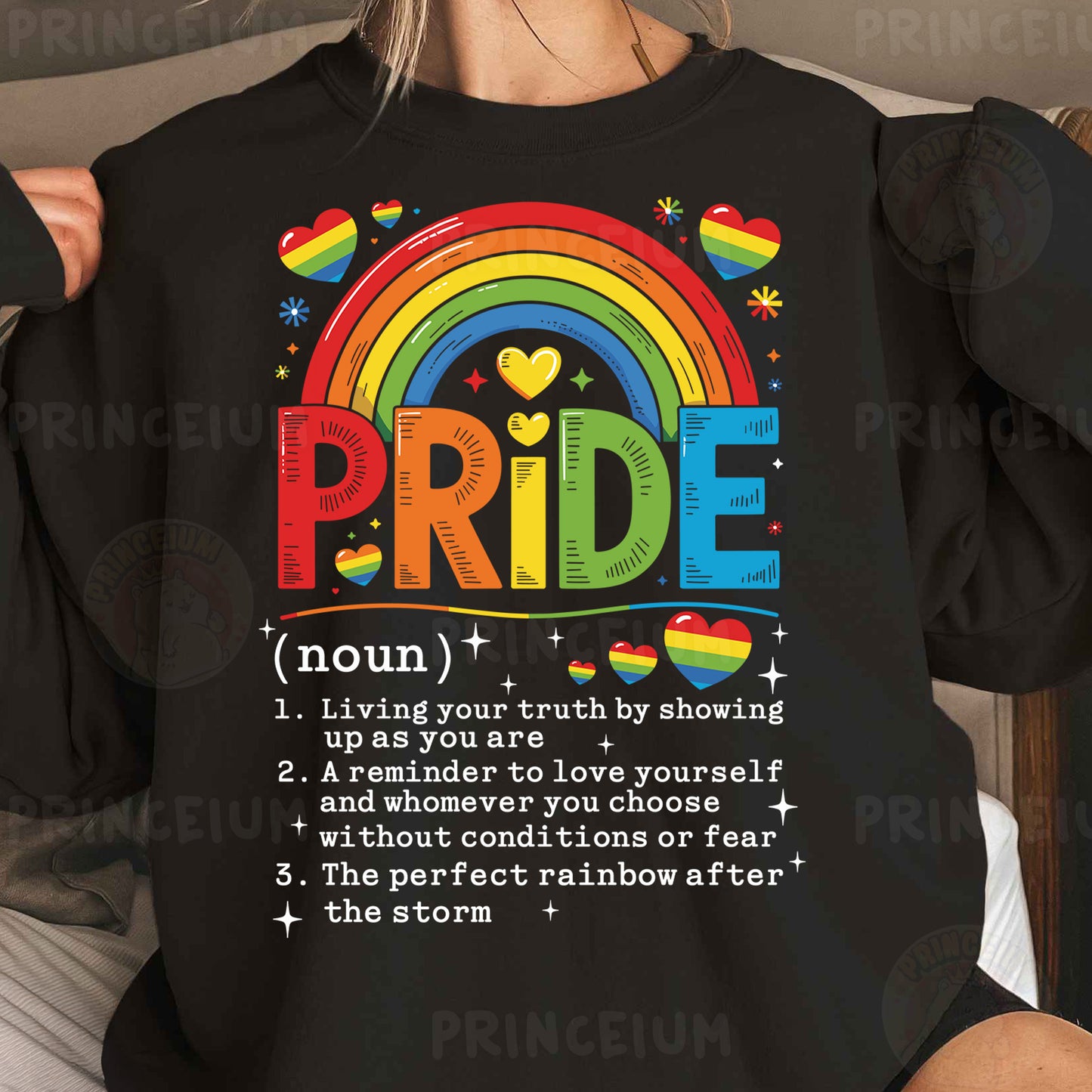 a woman wearing a black shirt with the words pride on it