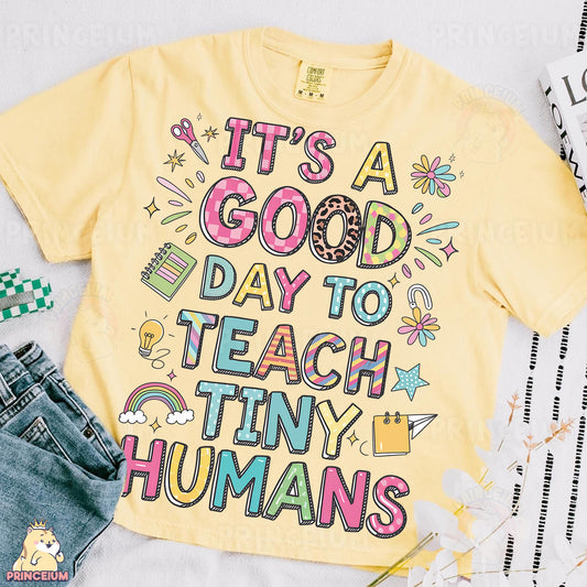 a t - shirt that says it's a good day to teach tiny humans