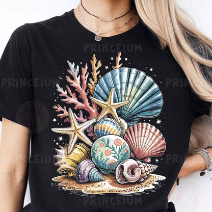 a woman wearing a black t - shirt with seashells on it