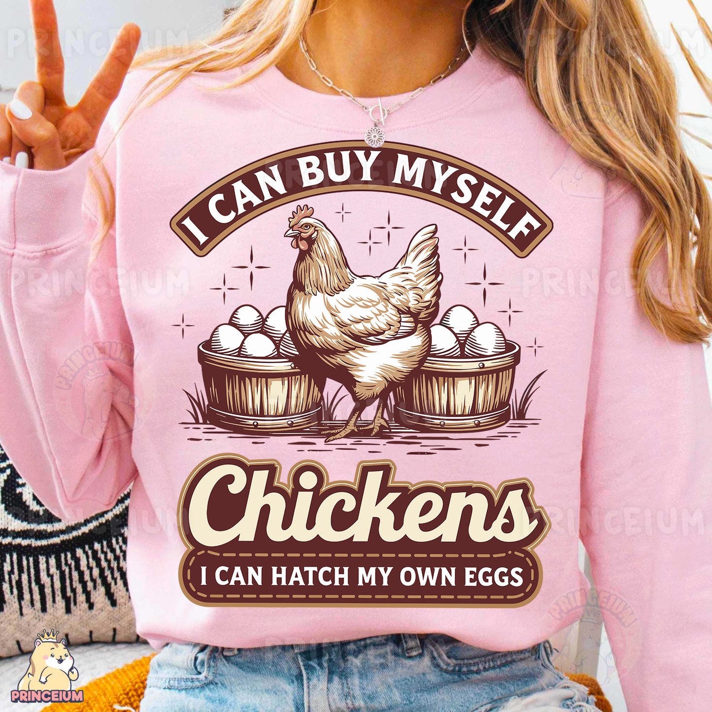 a woman wearing a pink sweatshirt with chickens on it