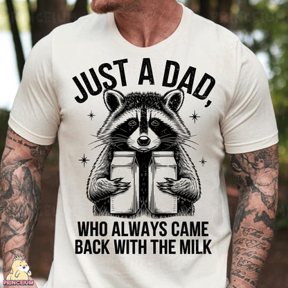 a man wearing a white t - shirt with a raccoon reading a book