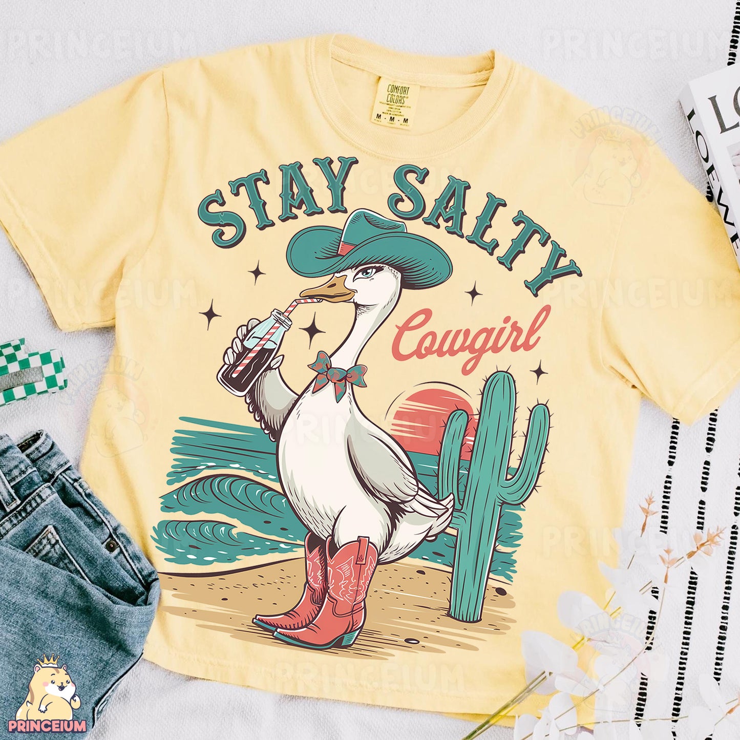 a t - shirt with a duck wearing a cowboy hat and boots