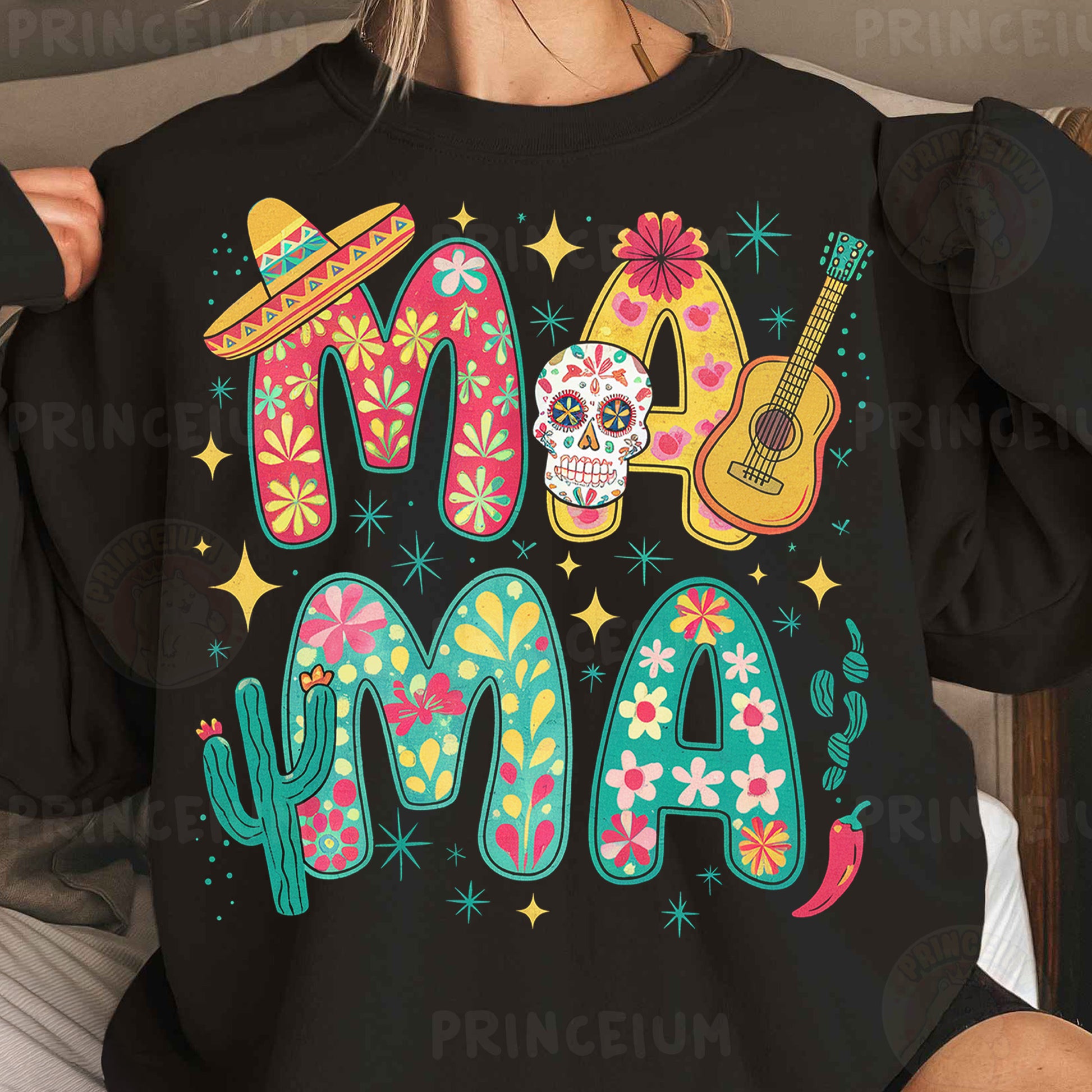a woman wearing a black shirt with a mexican design on it