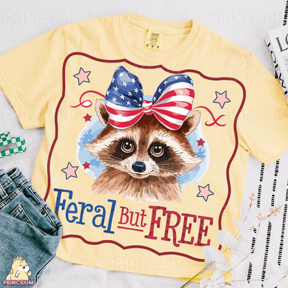 a t - shirt with a raccoon wearing a bow on it