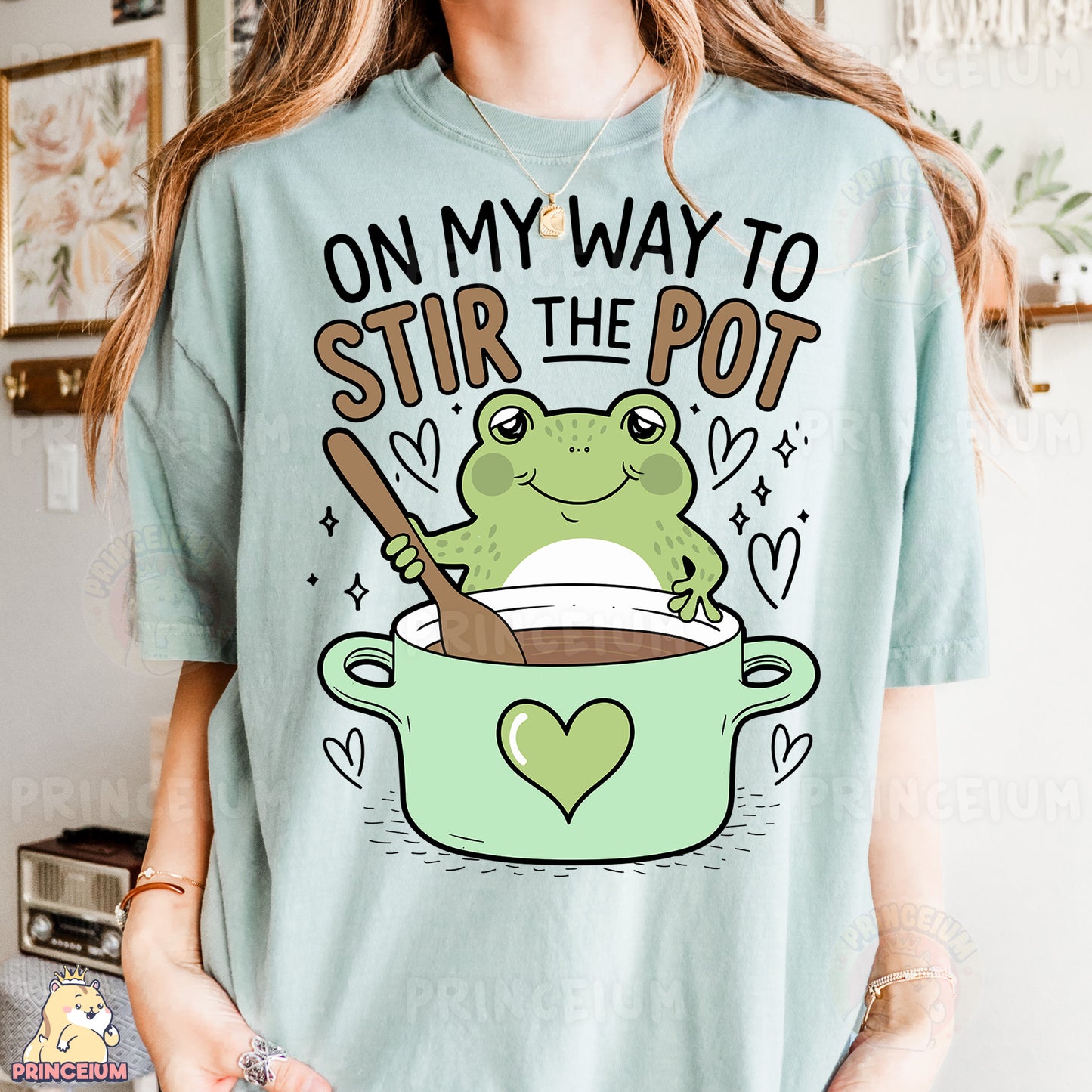 a woman wearing a t - shirt that says on my way to stir the pot