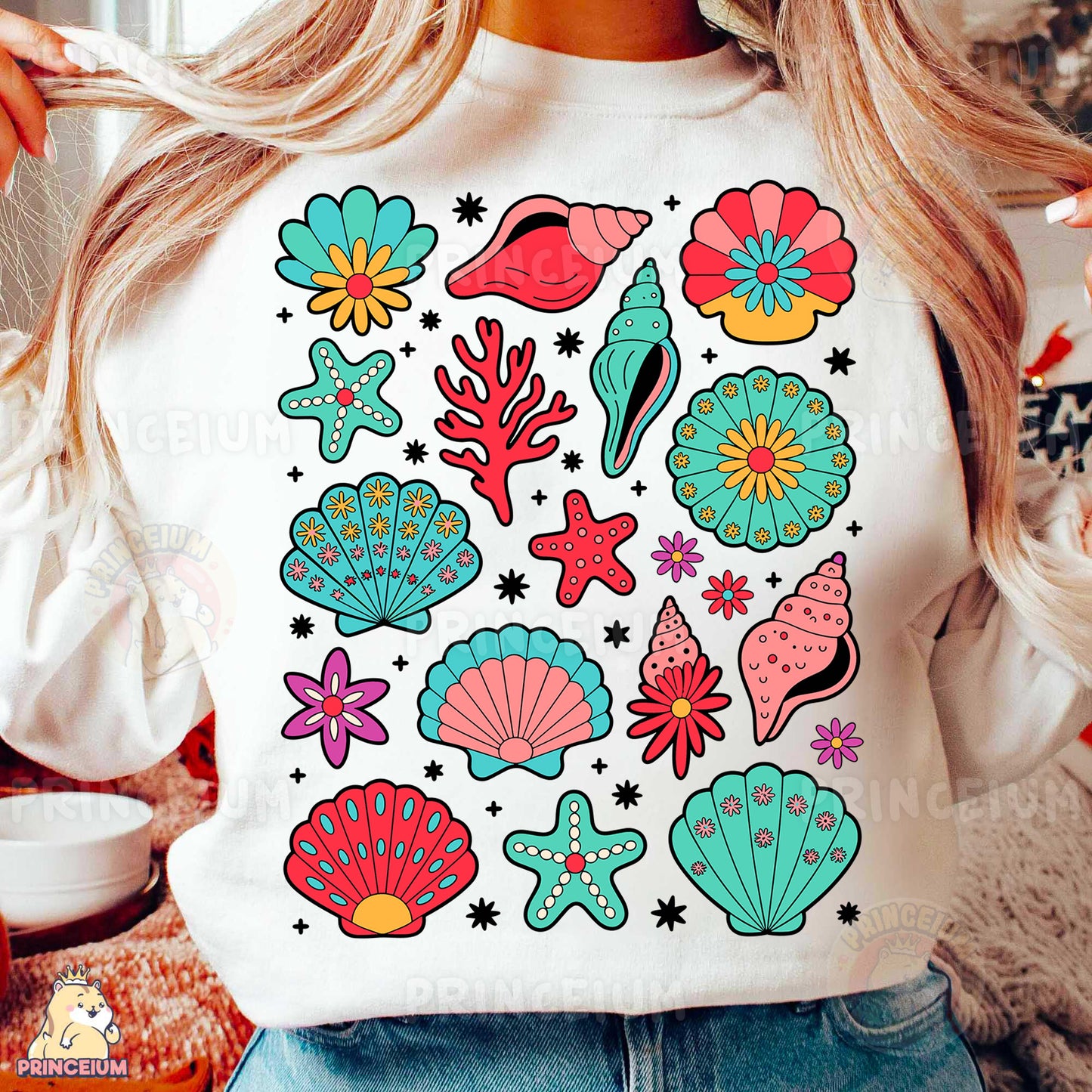 a woman wearing a white shirt with colorful sea life on it