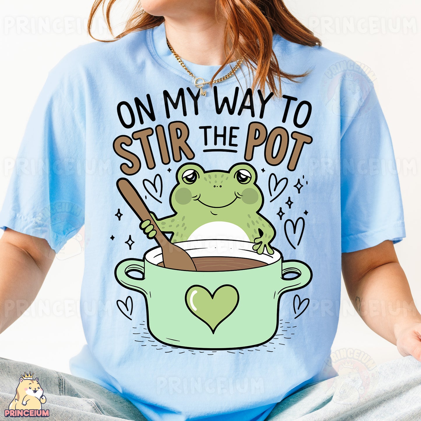 a woman wearing a t - shirt that says on my way to stir the pot