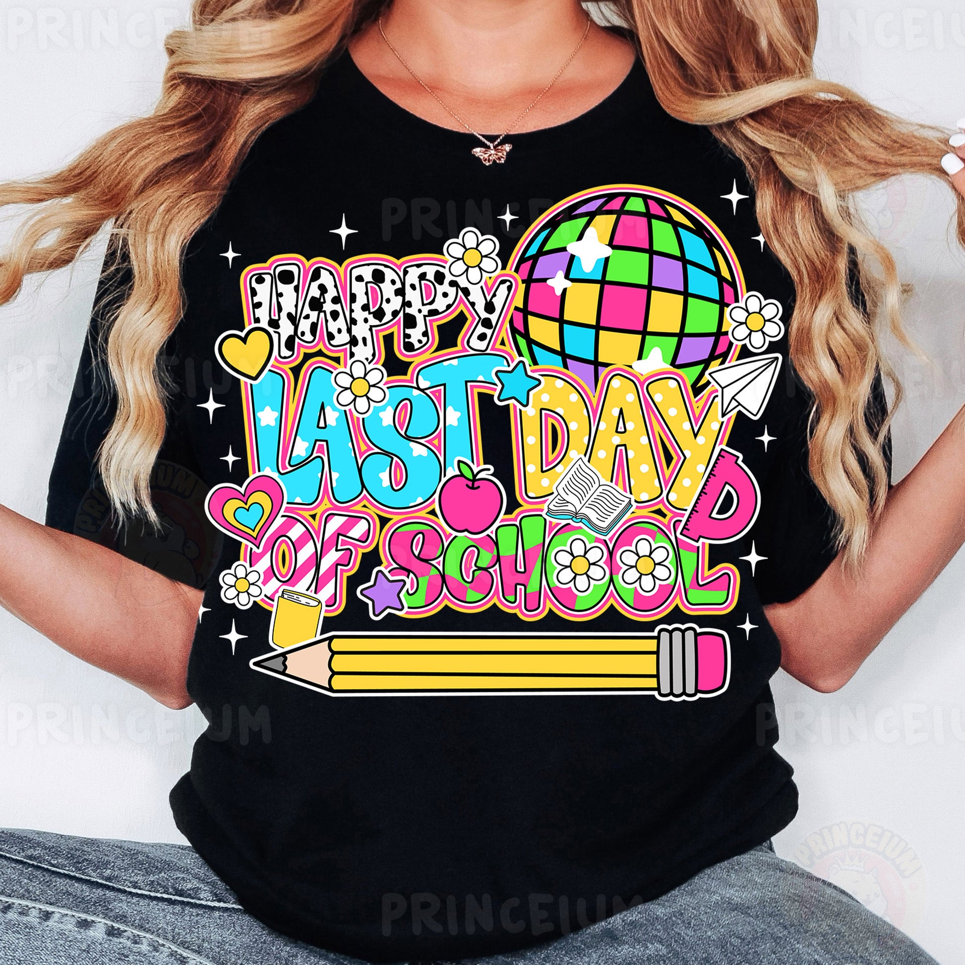 a woman wearing a black t - shirt that says happy first day of school