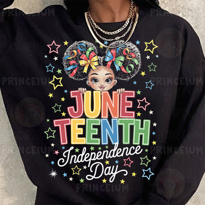 a woman wearing a black sweatshirt with a graphic on it